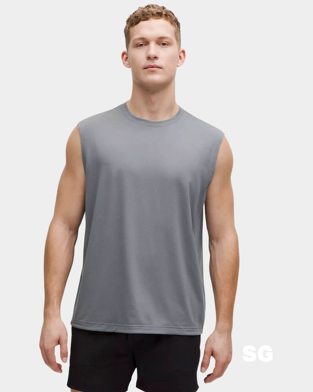 stylish man wearing a sleeveless workout top