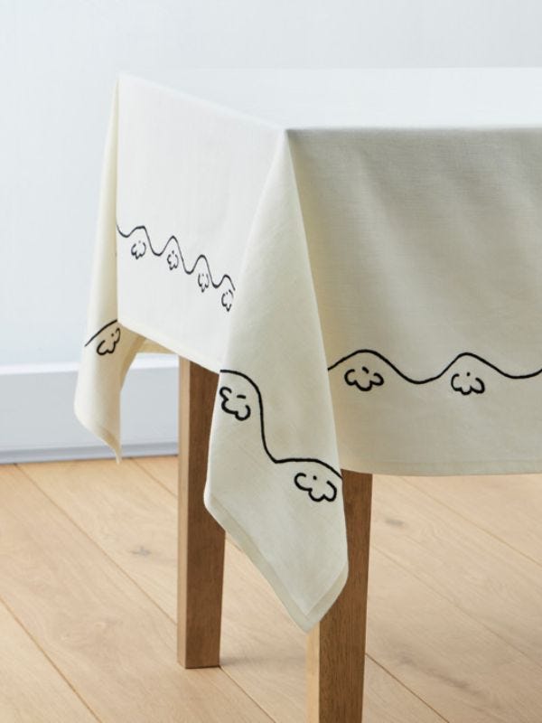white tablecloth with navy border