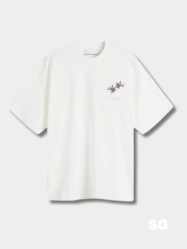 white t-shirt with small flowers detail at chest