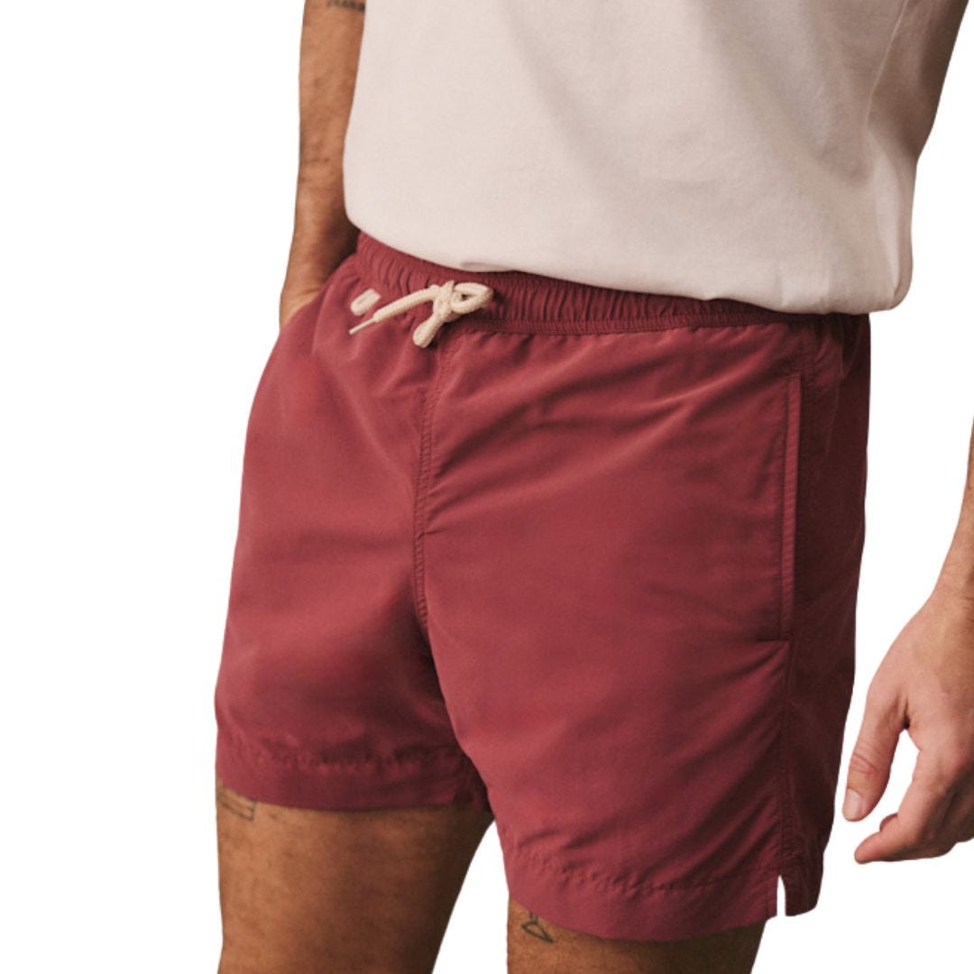 man wearing merlot-colored drawstring swim trunks