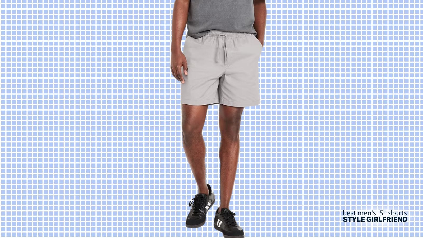 man from the waist down wearing grey 5-inch old navy drawstring shorts with black adidas samba sneakers