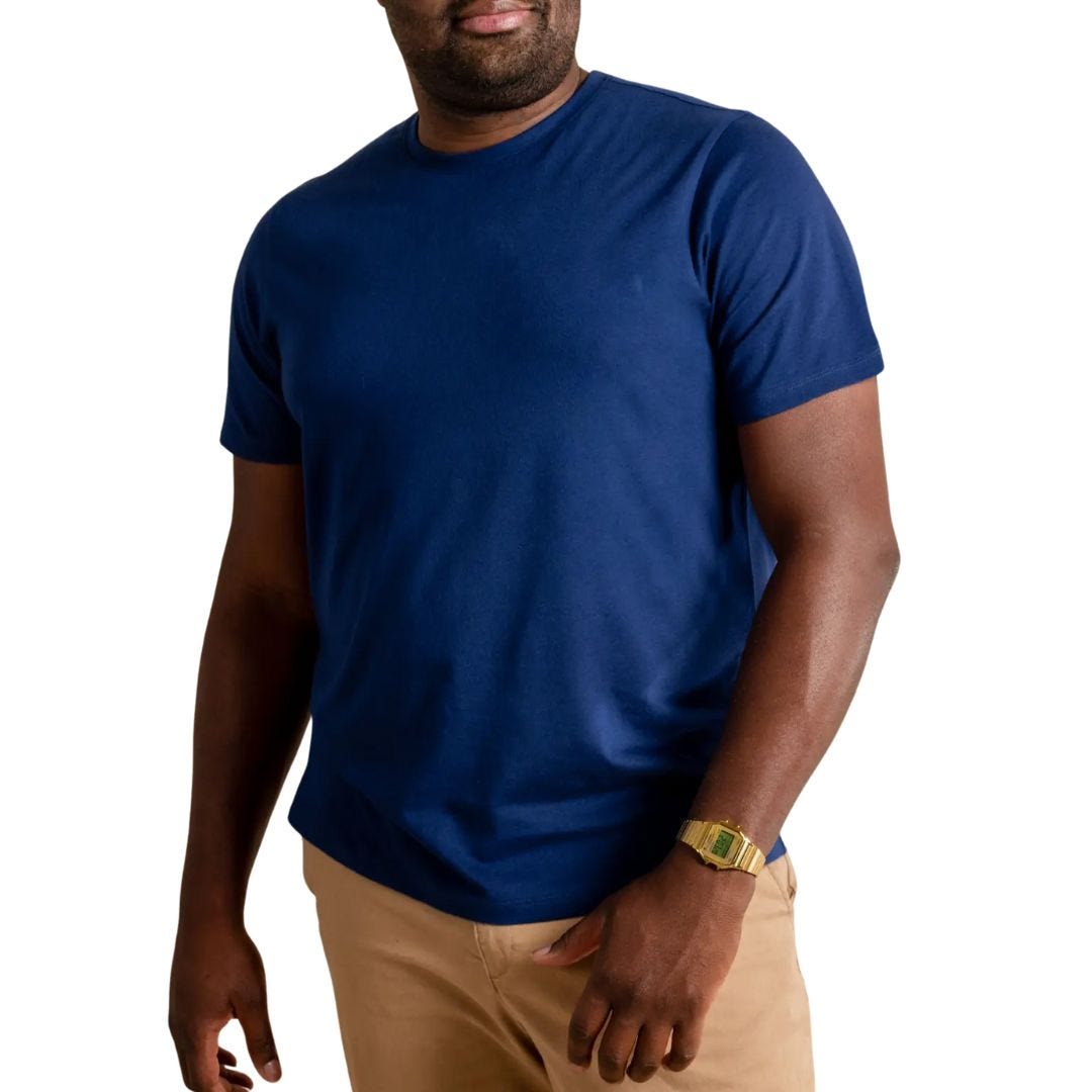 larger man wearing a blue t-shirt and chinos