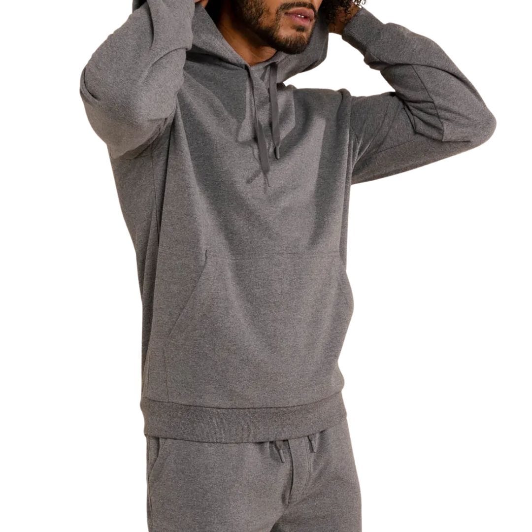 man wearing a grey hoodie sweatshirt