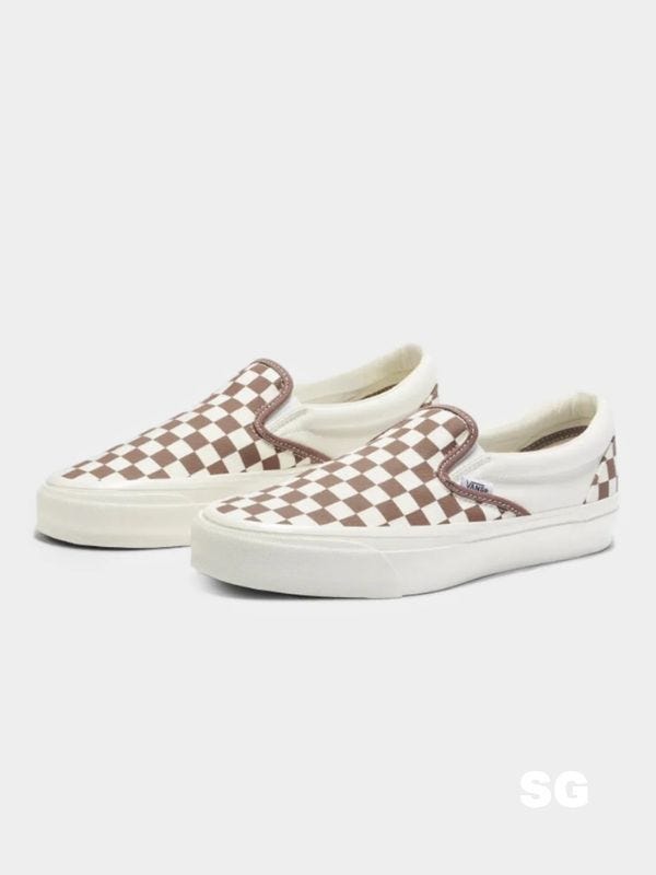 coffee and white checkerboard slip-on vans sneakers