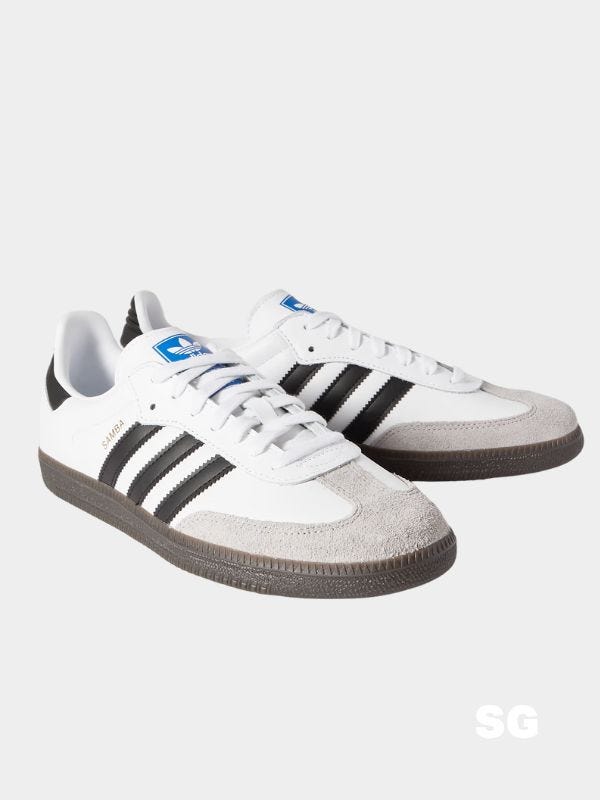 white adidas samba sneakers with black stripes